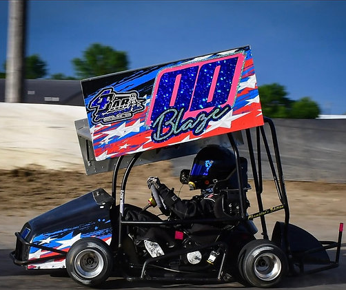 racer in colorful go kart