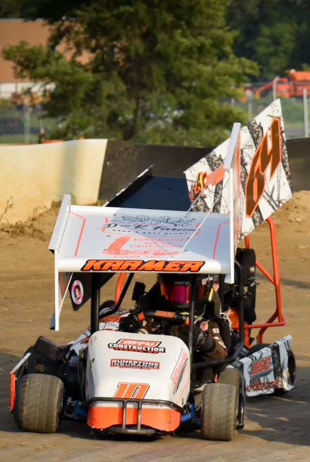 race official looking over the racers